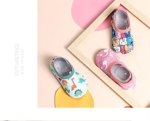 Detail of baby anti-slip floor socks with cute cartoon animal patterns and vibrant colors.