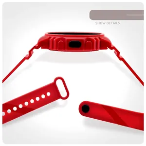 Close-up detail view of red sports digital watch case and adjustable silicone strap