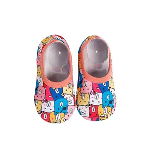 Anti-slip toddler indoor floor socks featuring colorful cartoon bear print patterns