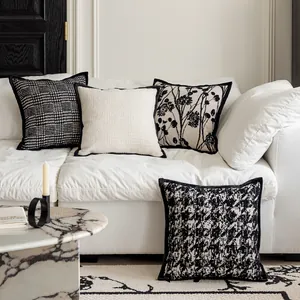 Set of black and white vintage throw pillow covers with houndstooth and floral prints