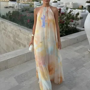 Elegant sleeveless halter neck maxi dress featuring vibrant watercolor abstract print