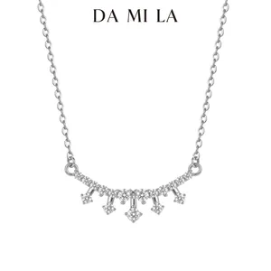 Detailed macro shot of an S925 sterling silver curved pendant necklace with sparkling stones