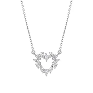 Close-up of S925 sterling silver necklace with sparkling heart-shaped moonstone pendant.