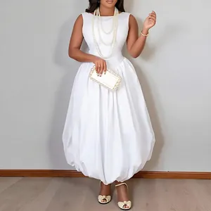 Elegant white sleeveless summer maxi dress featuring a slim waist and balloon hem