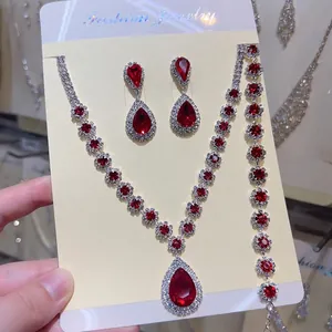 Detailed view of fashion red rhinestone necklace earring and bracelet set for party