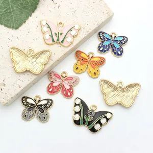 Detailed close-up of colorful enamel butterfly charms showing front and back designs