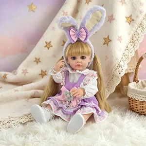 Detailed view of a realistic reborn doll wearing a purple bunny ear headband and dress