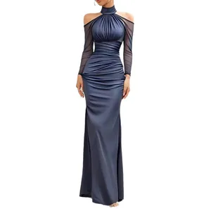 Elegant navy blue cold-shoulder evening gown featuring sheer sleeves and a stylish ruched waistline.