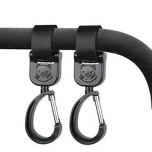 Universal black stroller hooks with cute cartoon bear design and velcro straps