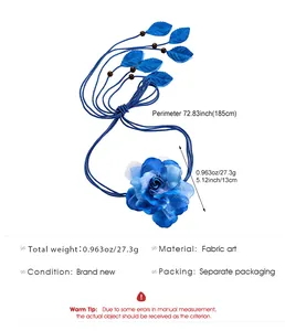 Detailed view of bohemian blue fabric flower waist rope belt for ethnic style dresses