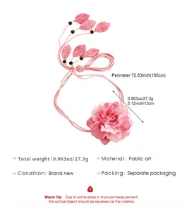 Detail view of pink bohemian fabric rose waist chain with measurement annotations
