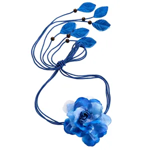 Close-up of bohemian blue flower waist rope featuring leaf accents and wood beads