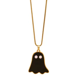Detailed view of a black enamel ghost pendant on a gold-plated box chain necklace