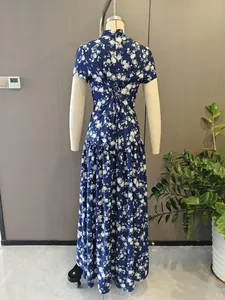 Detailed rear view of a slim-fit blue floral maxi dress with waist-tie design.