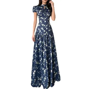 Elegant navy blue floral print maxi dress featuring a mock neck and keyhole cutout design
