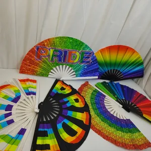 Collection of various rainbow pride folding fans with bamboo ribs and vibrant fabric surfaces