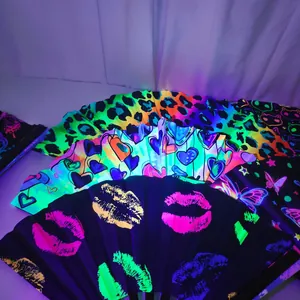 Neon UV reactive folding fans with leopard, heart, and lip patterns for dance and rave