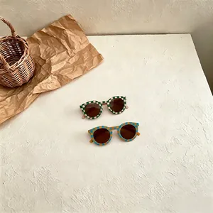 Retro checkerboard sunglasses for kids with UV protection in green and blue