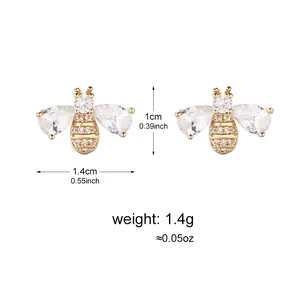 Elegant gold bee stud earrings with clear zircon stones and size specifications