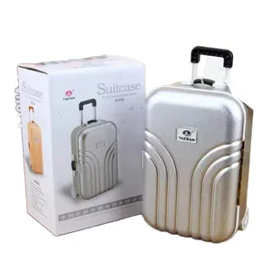 Silver miniature luggage suitcase shaped piggy bank and jewelry organizer box for kids