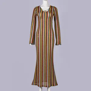 Slim fit long-sleeved maxi dress featuring a vibrant multi-color zigzag chevron knit pattern