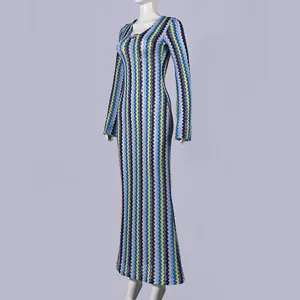 Detailed view of the colorful zigzag knit pattern on a slim-fit V-neck maxi dress
