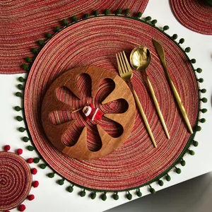 Nordic red woven placemat and coaster set with green pom-pom trim decoration
