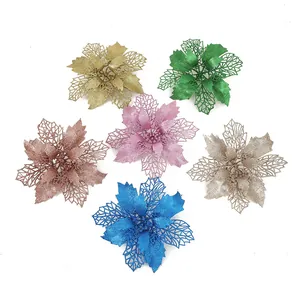 Set of six colorful glitter Christmas poinsettia flowers for festive tree and wreath decoration