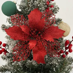 Sparkling red glitter poinsettia flower decoration for Christmas tree and wreath.