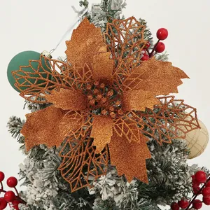 Detailed macro shot of a bronze glitter artificial poinsettia Christmas flower decoration