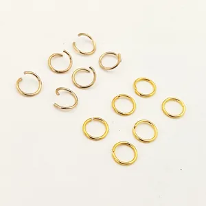 Detail view of electroplated copper open jump rings for DIY jewelry connection.