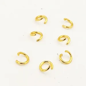 Detailed macro view of gold plated copper open jump rings for DIY jewelry jewelry craft