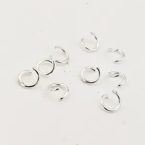 Detailed close-up view of silver open jump rings for DIY jewelry connection accessories