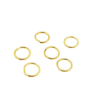 Detailed macro view of high-quality gold plated copper open jump rings for DIY jewelry