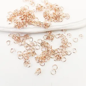 Macro detail of high-quality rose gold plated copper open jump rings for DIY jewelry