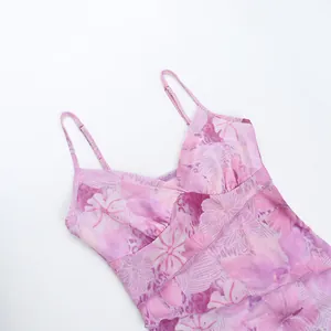 Detailed view of the pink floral print camisole featuring delicate ruffled layers