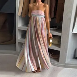 Detail of a strapless striped maxi dress with flowing silhouette for beach vacation