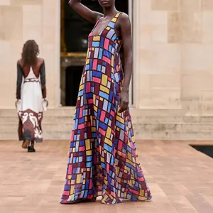 Elegant loose geometric sleeveless maxi dress with a colorful abstract stained glass pattern
