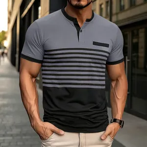 Detail view of men's slim fit color-block polo shirt with stripes and chest pocket