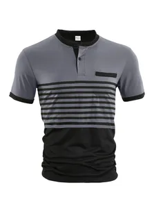 Detailed view of grey and black striped men's polo shirt with a chest pocket detail