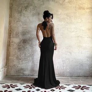 Elegant sexy backless halter neck black evening maxi dress detail shown from the rear view