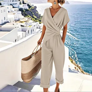 Elegant women's solid color short sleeve loose jumpsuit with wrap V-neck design