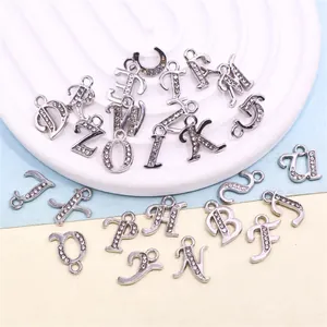 Set of 26 sparkling rhinestone alphabet charms in silver alloy for DIY jewelry making