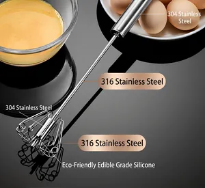 Detail view of a 316 stainless steel semi-automatic egg whisk on a black surface