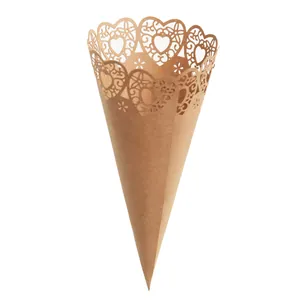 Close-up detail showing the intricate laser-cut heart pattern on a kraft paper wedding cone