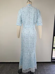 Back view of an elegant light blue floral print dress featuring a white lace trim hemline