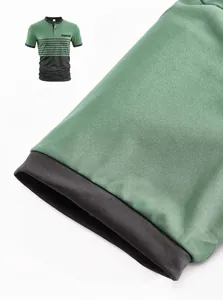 Close-up view showing the short sleeve detail of a striped color-block polo shirt for men.