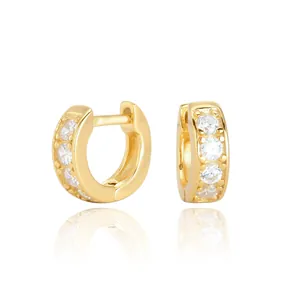 Detail view of gold-plated S925 sterling silver hoop earrings with clear CZ inlays