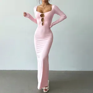 Elegant sexy pink long-sleeved maxi dress with square neck and metal ring cut-outs
