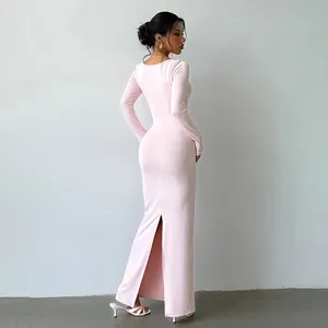 Sexy light pink long sleeve bodycon maxi dress featuring a stylish back slit detail